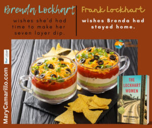 seven layer dip in glass cup with chips and copy of book