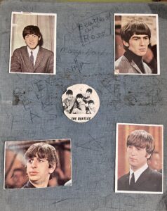 cover of scrapbook from 1964 with photo cards of each of the Beatles.