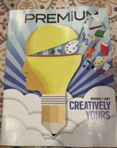 cover of premium magazine. yellow head open with creative symbols pouring in