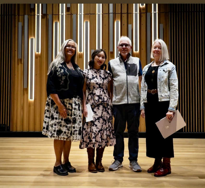 Three women and one man